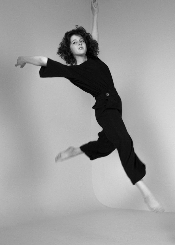 Woman Wearing Black Dancing